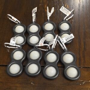 Simple Dimpl Glow-in-the-Dark Keychains. Set Of 8